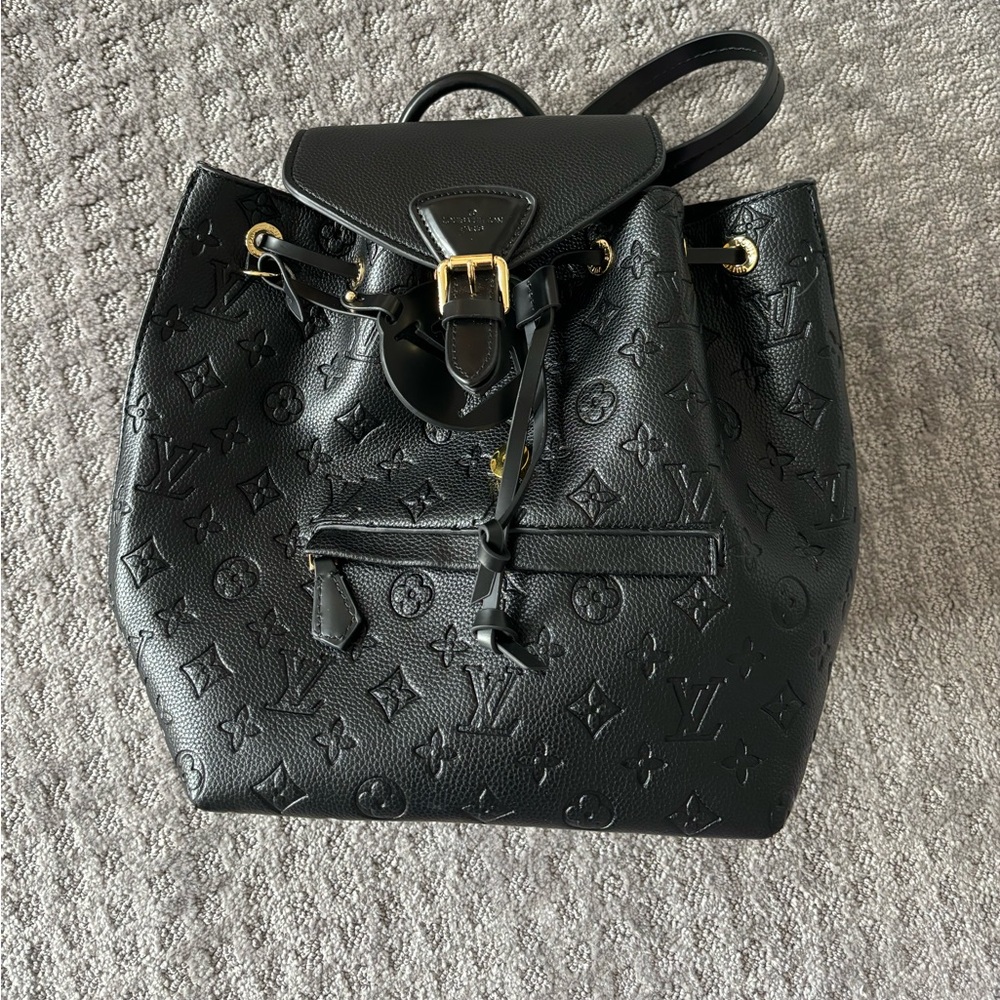 Black leather dupe backpack